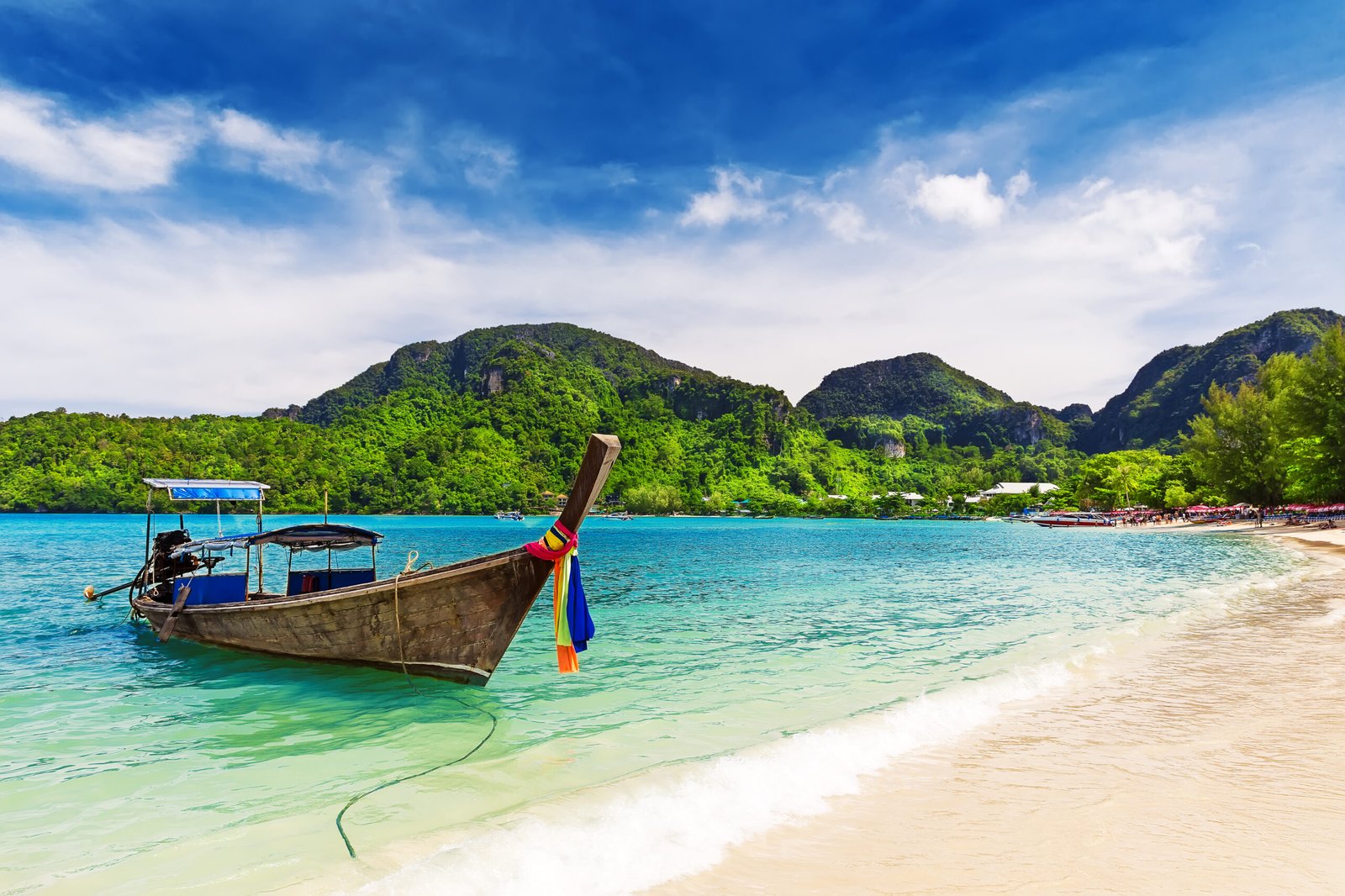 Long tail boat on tropical beach, Krabi, Thailand